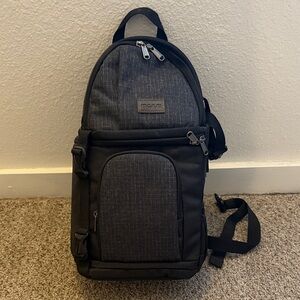Black Sling Camera Bag With Modular Shockproof Storage for Professional Gear